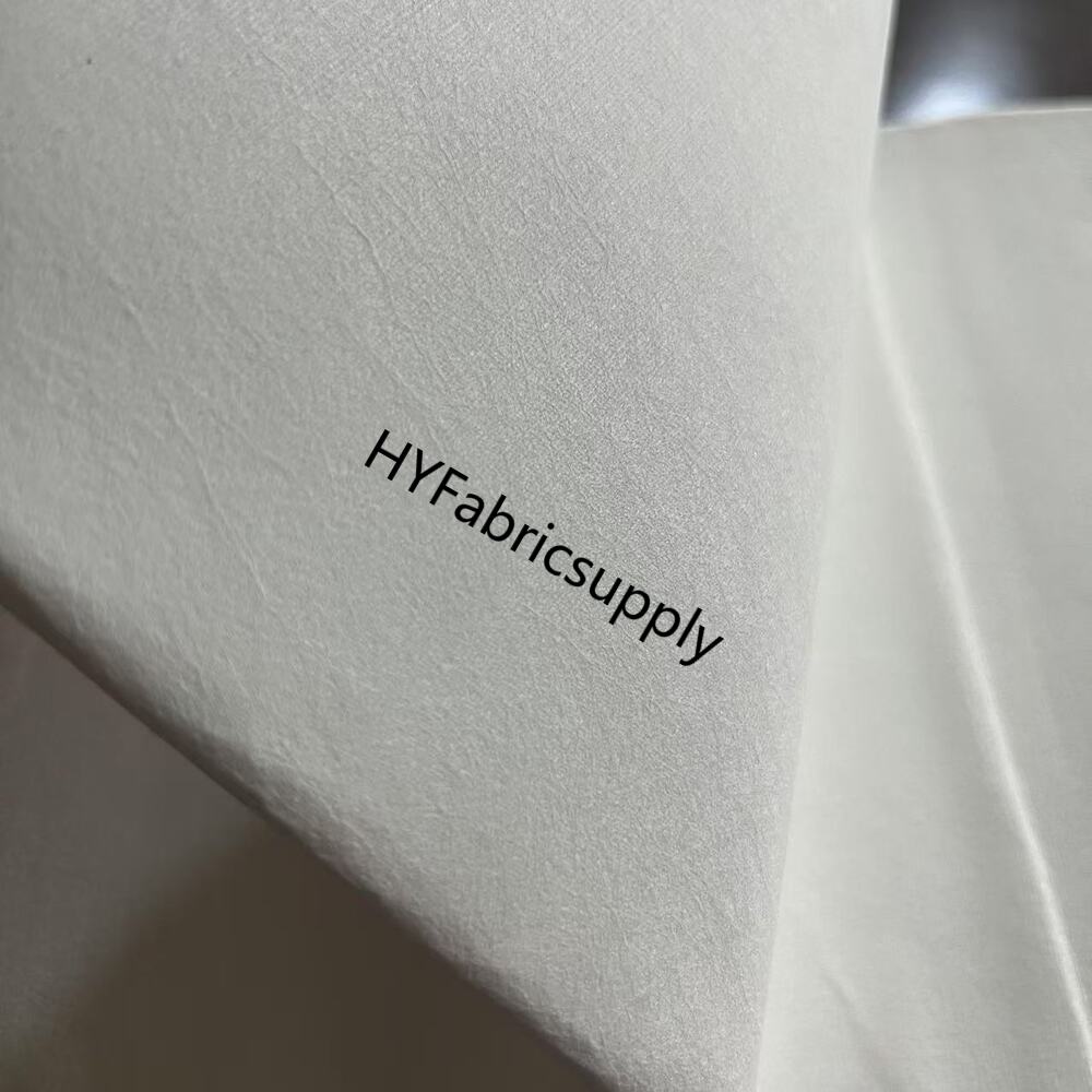 What is polyester filament spunlace non-woven fabric?